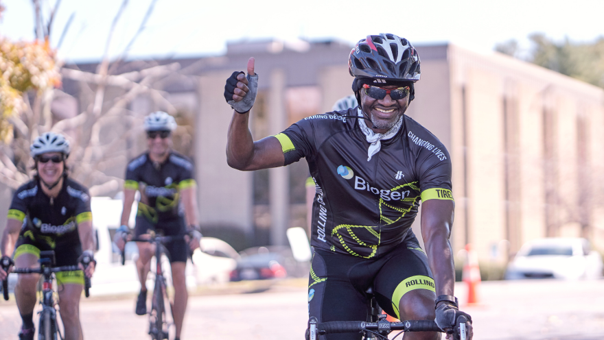 Event Details Massachusetts Ride to Defeat ALS Man Giving Thumbs Up Riding Biogen Rider