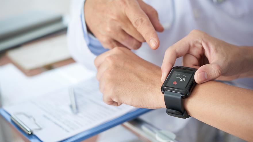 Doctor and patient using smart watch
