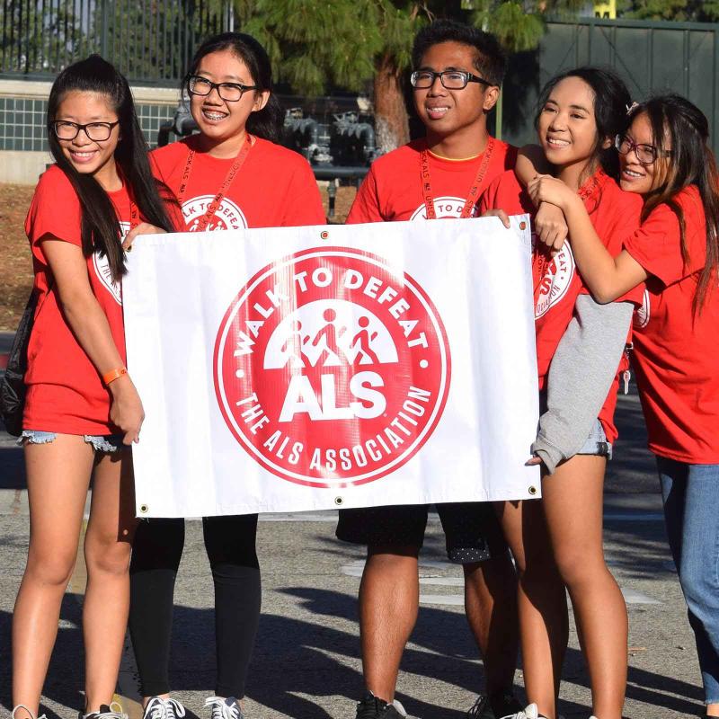A group of young people at a Walk to Defeat event